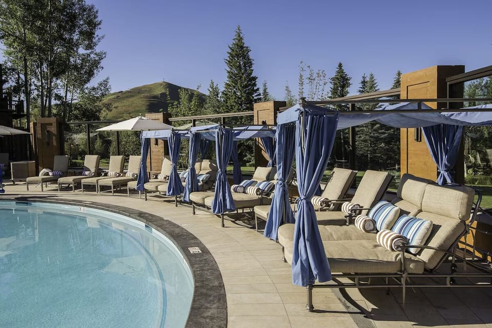 Lounge in shaded cabanas and savor breezy, private pool moments.