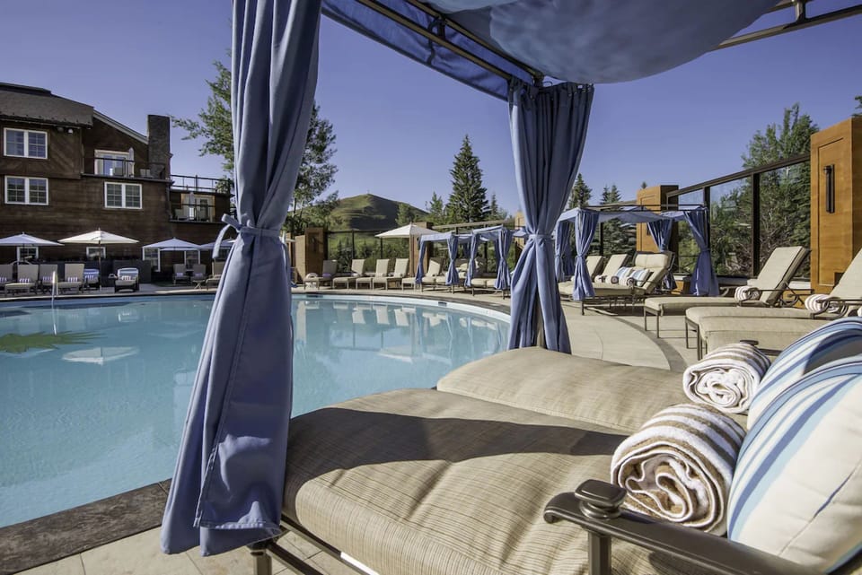 Stretch out poolside beneath swaying cabana drapes and fresh towels.