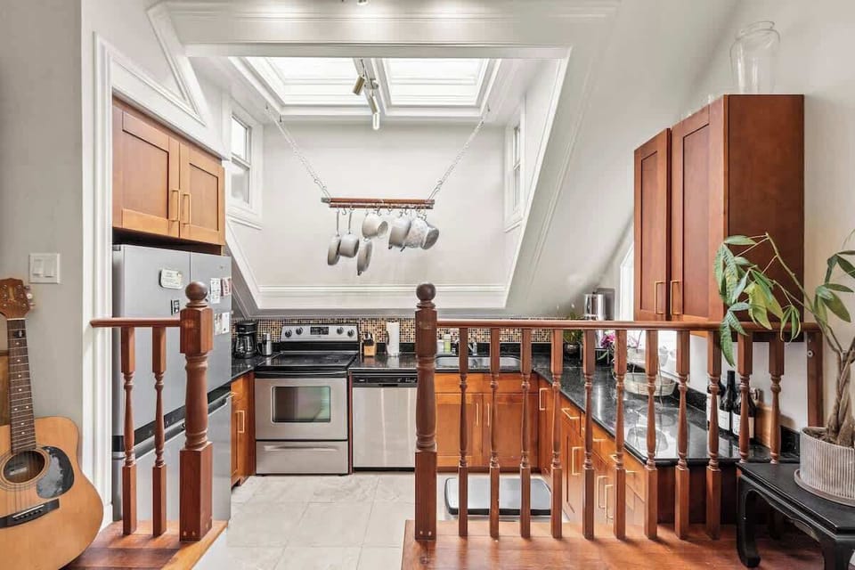 Fully equipped kitchen with modern appliances.
