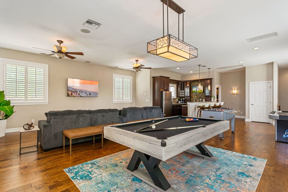 Enjoy a game of billiards or other games in the Game Room Suite