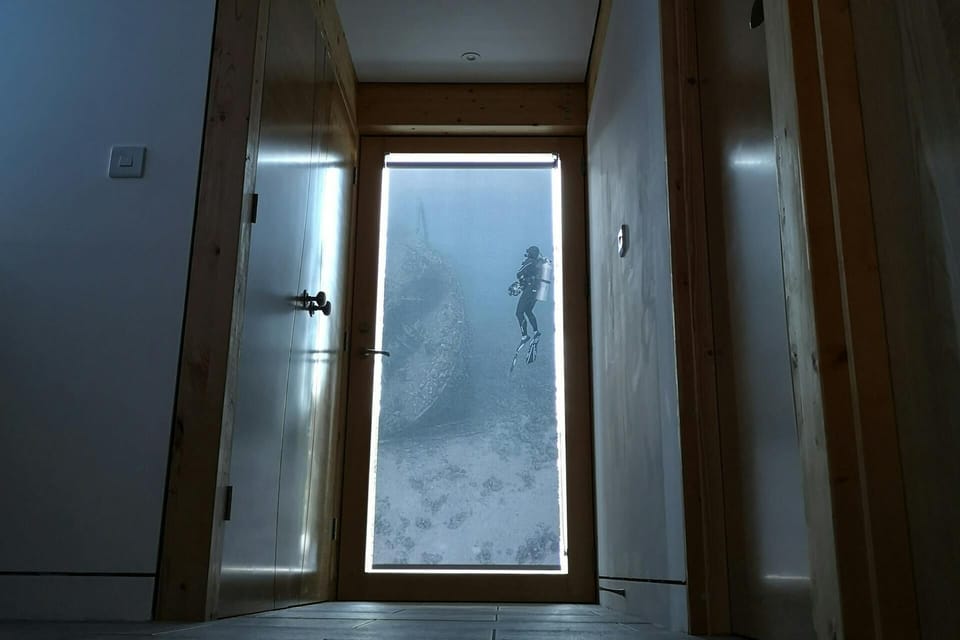 The doors to the rooms in the hallway