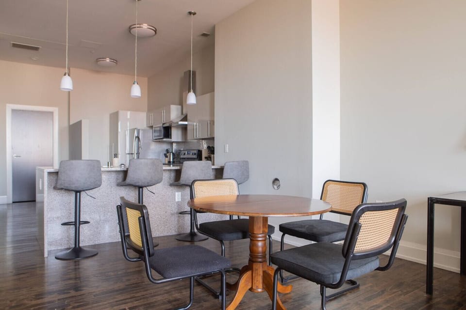 Flexible dining table/workspace - perfect for a morning coffee, a shared meal, or a comfortable spot to catch up on emails