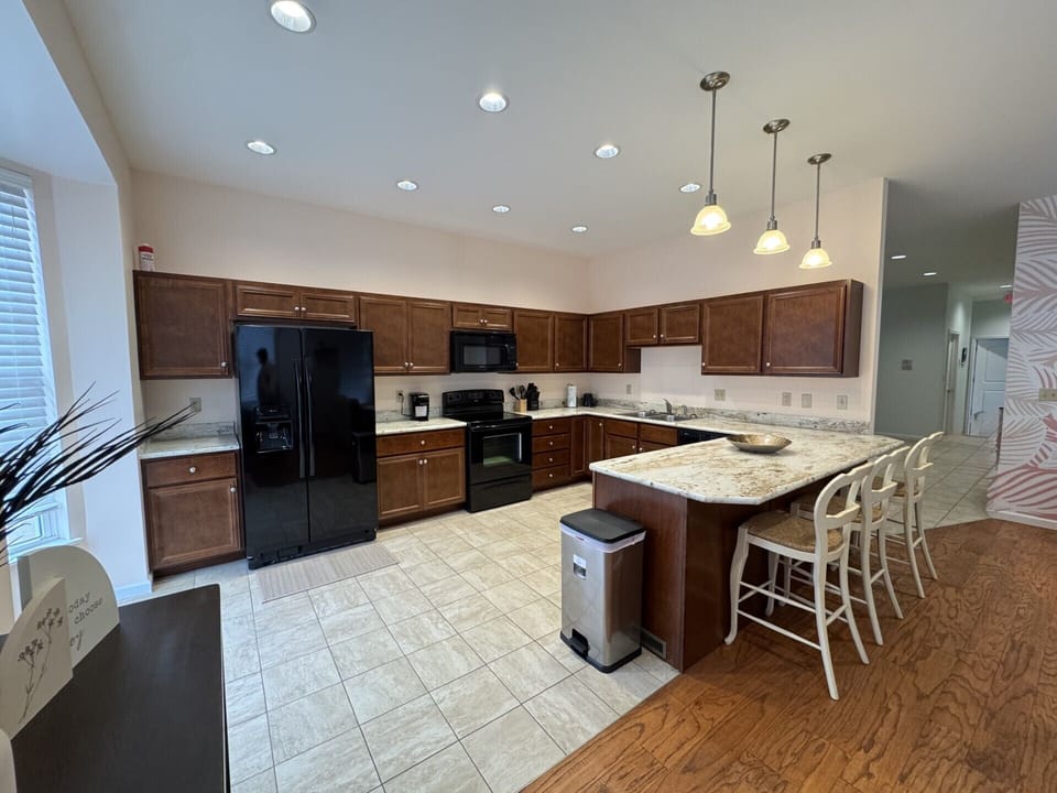 Large kitchen with all appliances & utensils