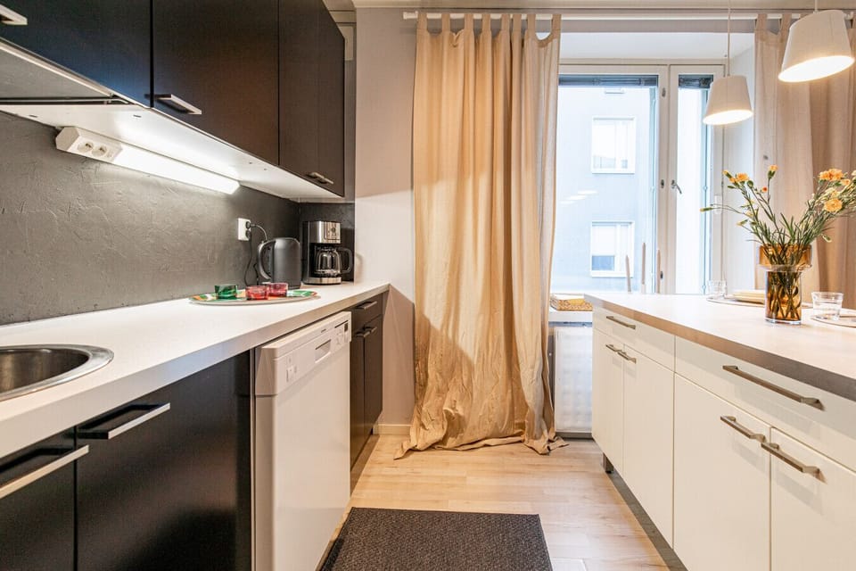 Apartment open-concept kitchen with dishwasher
