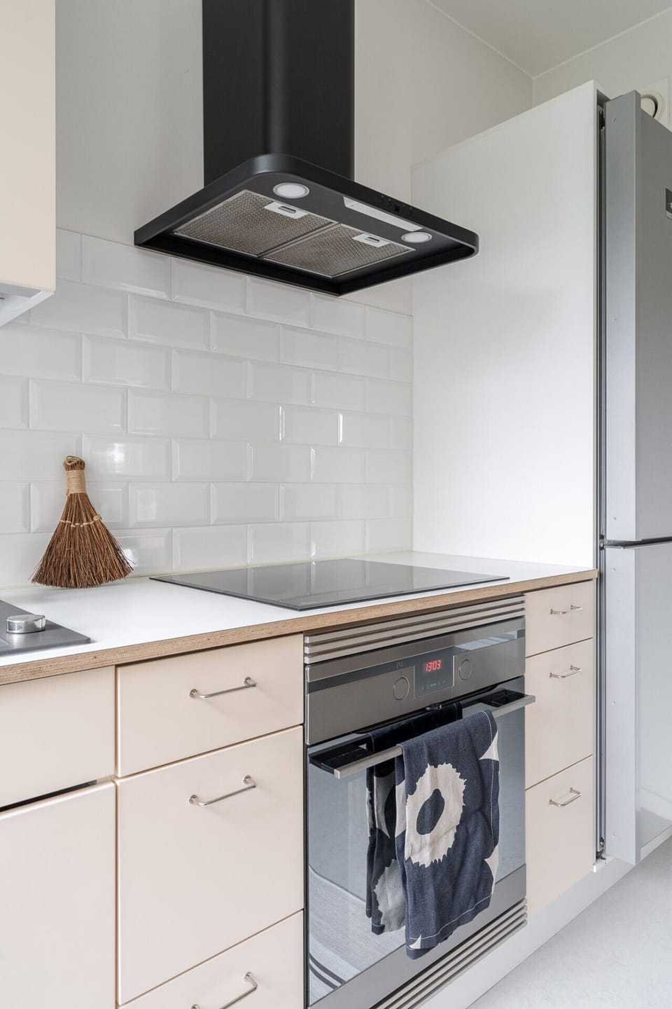 The modern induction cooktop and oven allow for precise and efficient meal preparation during your stay.