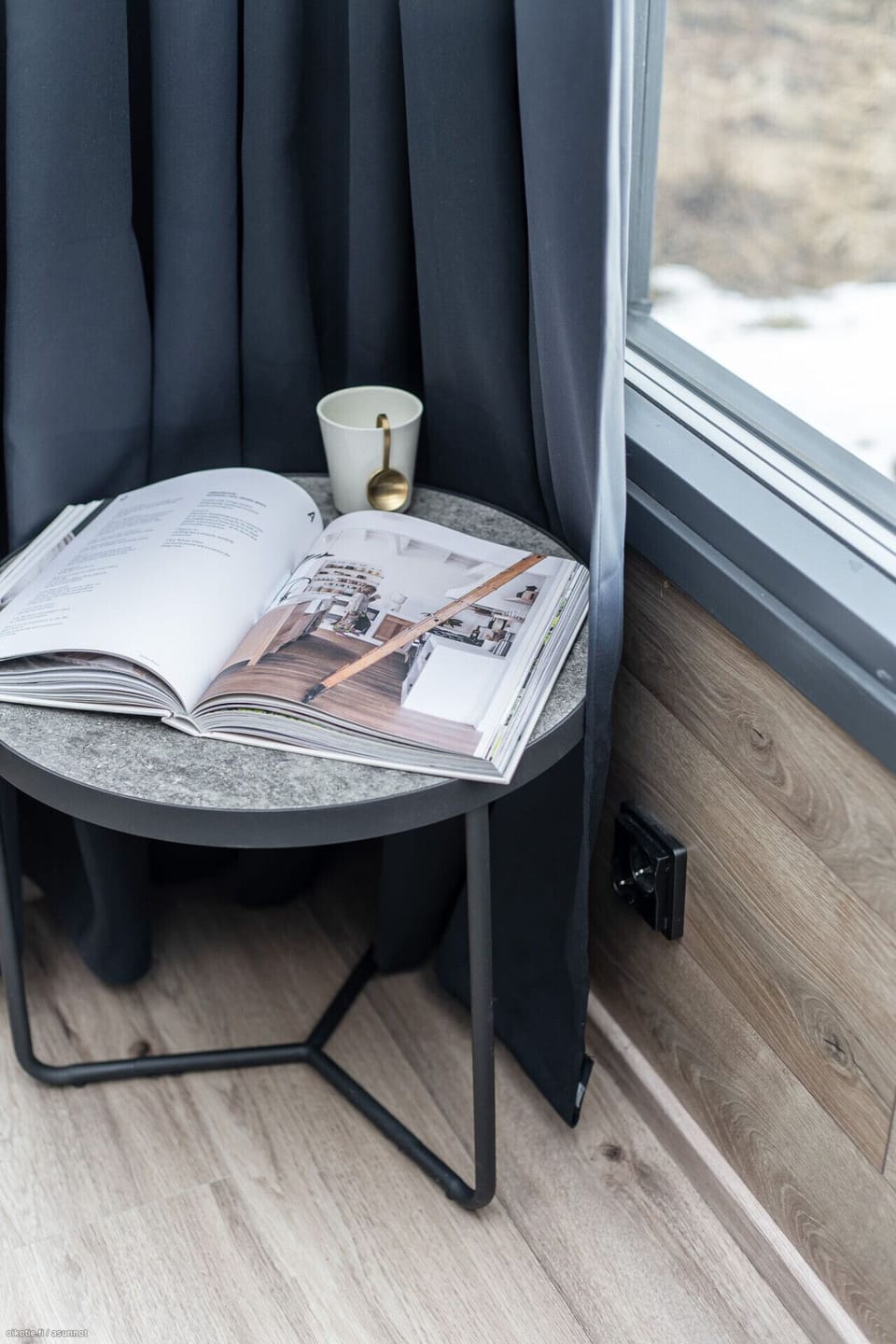 Find a quiet moment to unwind in this peaceful corner by the window. It`s the perfect spot to relax with a good book and a warm cup of coffee or tea while enjoying the scenic views.