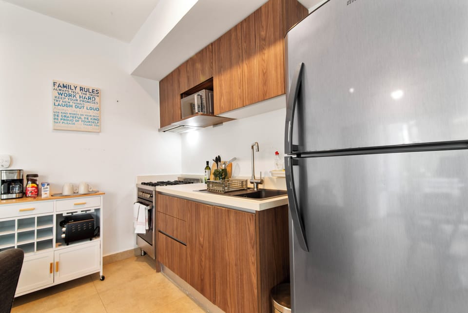 Cook in style! Our stocked kitchen has a microwave, fridge, coffee maker & 4-burner stove.