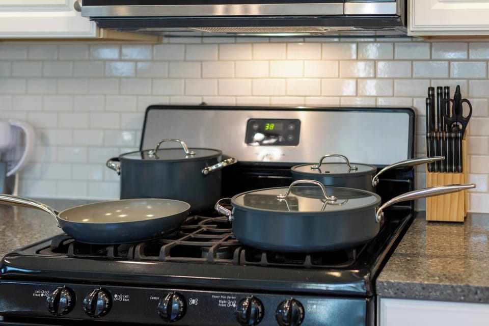 In the kitchen, you’ll find a set of Green Pans, a healthier choice with a ceramic coating free of harmful chemicals like Teflon. 