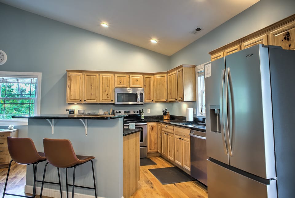 Kitchen is outfitted with an Electric Range