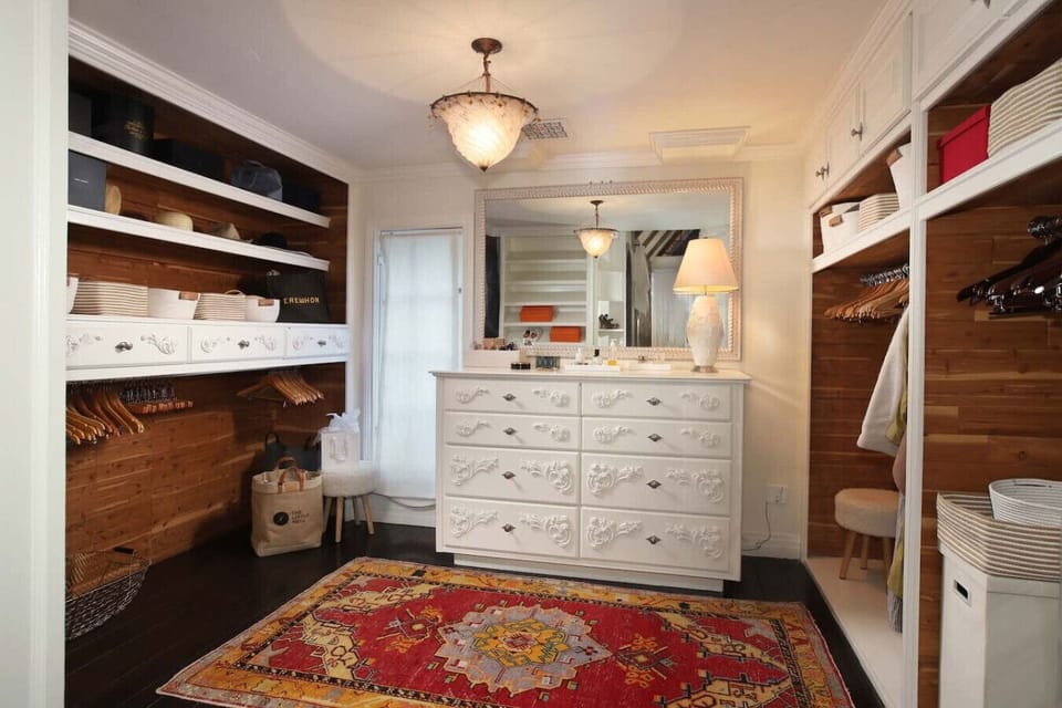 A walk-in closet designed to keep your stay organized and stress-free.