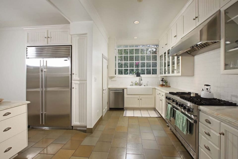 Bright and modern white kitchen, fully stocked for your convenience