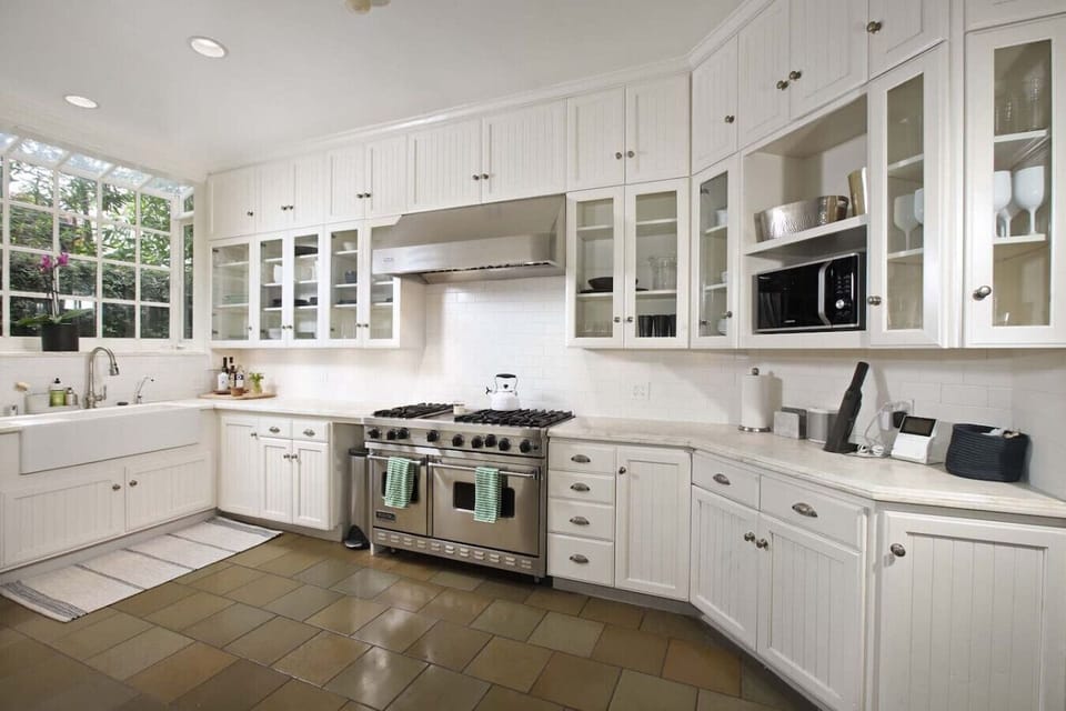 Bright and modern white kitchen, fully stocked for your convenience