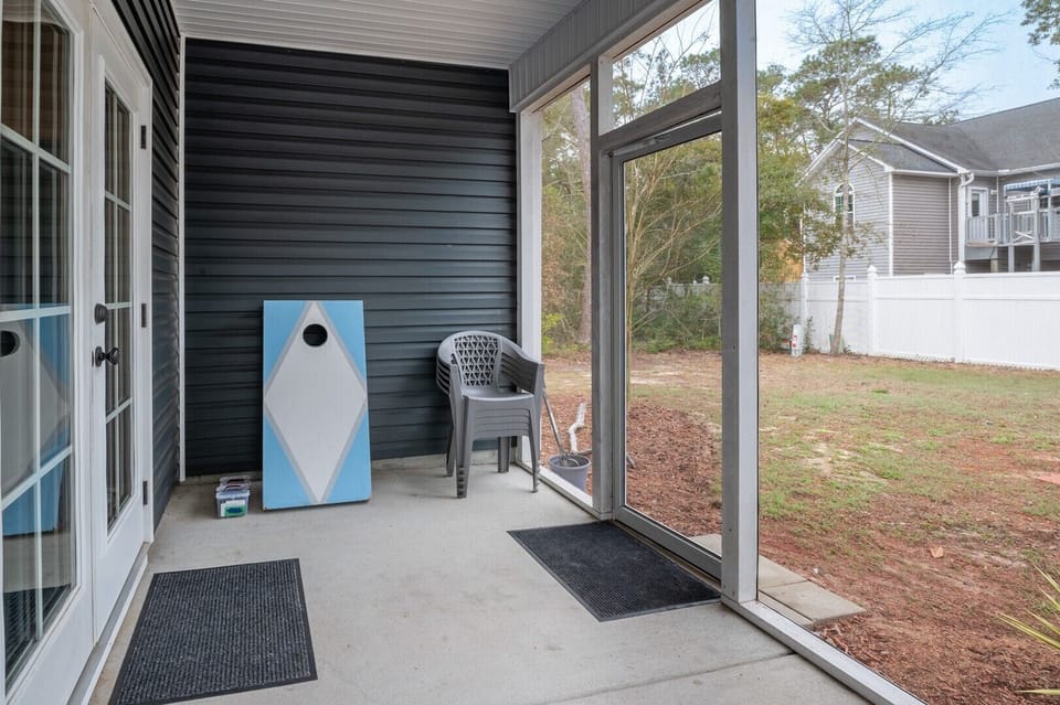 Back Yard Screened Porch and Cornhole Boards