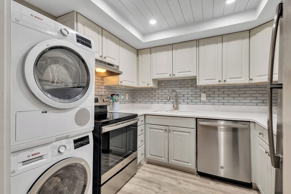 The fully equipped kitchen is perfect for cooking and meal prep, featuring all the essentials for your culinary needs.