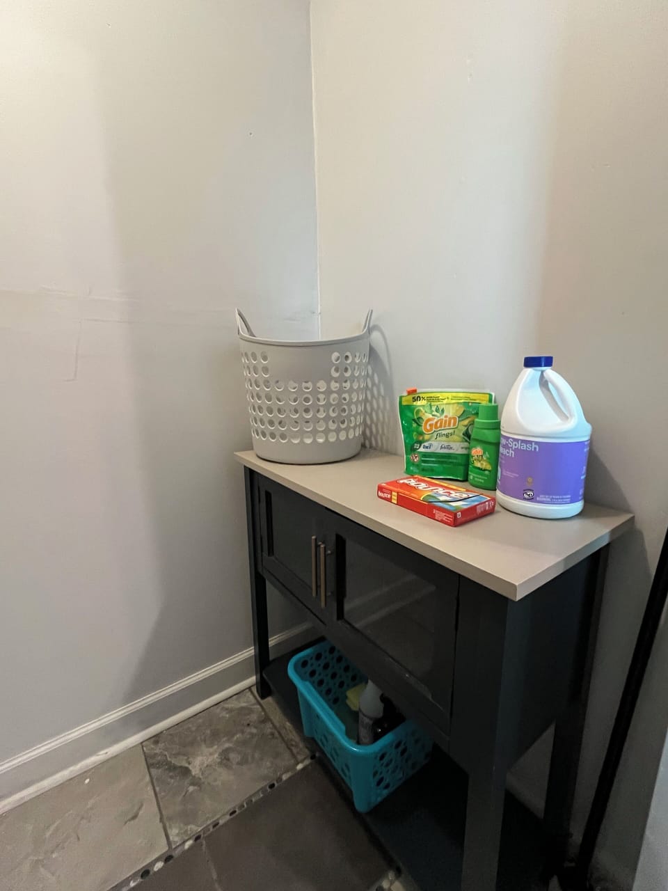 Laundry center with stocked essentials.