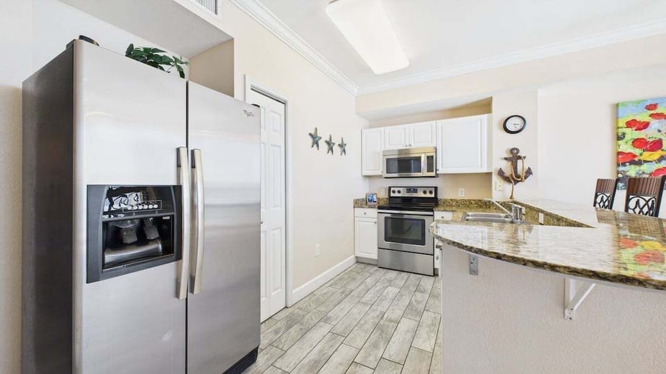 Full kitchen with stainless appliances and all the cooking essentials