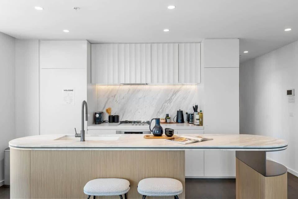 Cooking becomes a breeze in a spacious, functional kitchen with a sleek countertop and modern design.