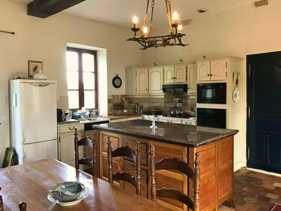 Main house open-plan kitchen and dining area.