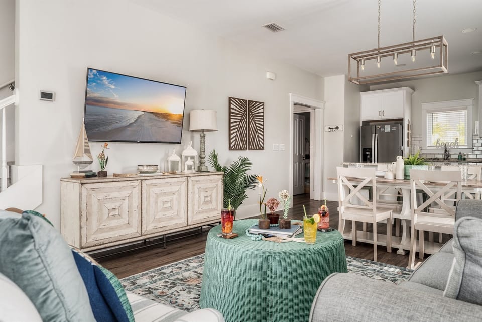 Relax in the cozy living room with a balcony, bringing the outdoors in.