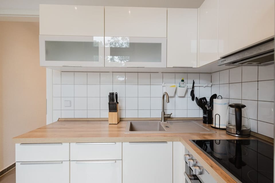 Fully equipped kitchen with modern appliances and stylish finishes.