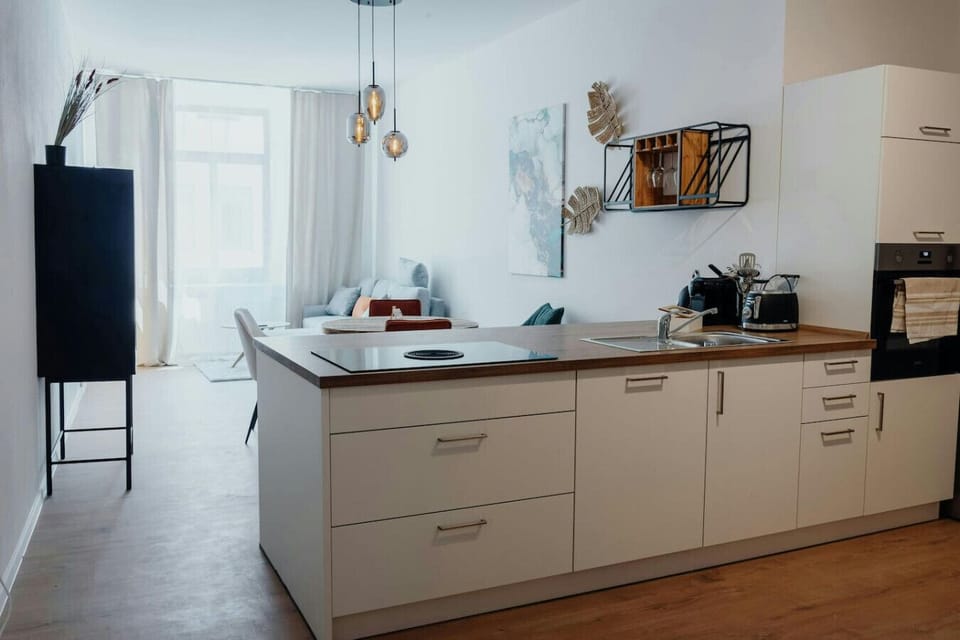 Open kitchen with a view of the living and dining area.