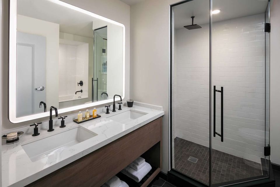 Refresh in a sleek spa-style bath with glass shower.