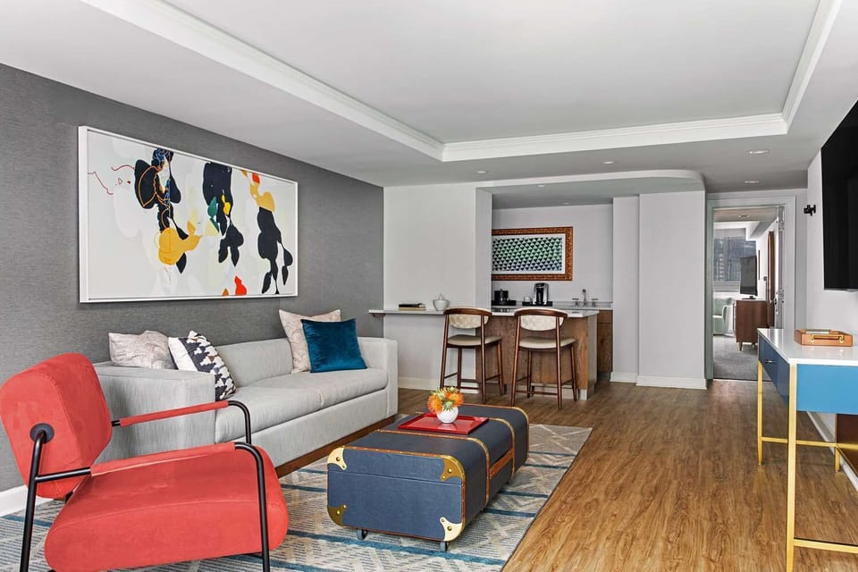 Lounge comfortably with open sightlines from sofa to kitchen.