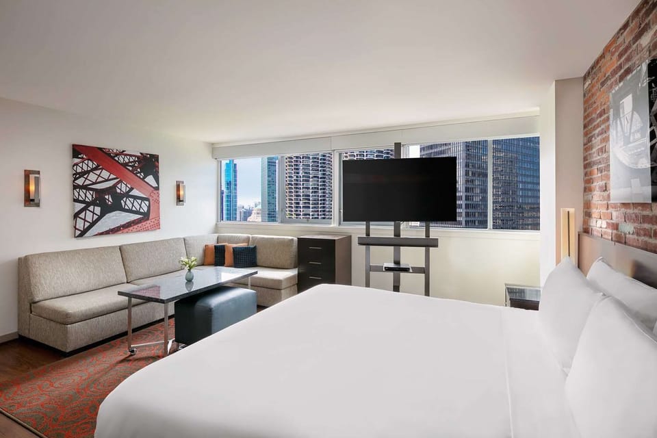 Recharge in a bright corner room with extra lounge seating.