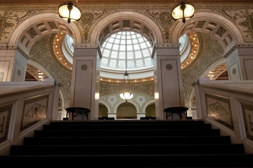 Step into a grand lobby with dramatic historic elegance.