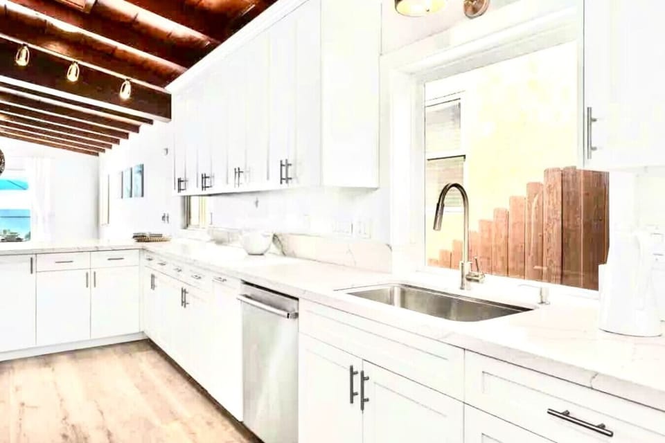 `Oceanfront beach house in Oceanside, California with no street or sidewalk between the home and the sand. Wake up directly on the beach and enjoy one of the most desirable beachfront vacation rentals in Southern California.`