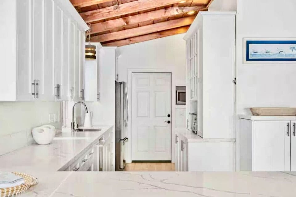 `Oceanfront beach house in Oceanside, California with no street or sidewalk between the home and the sand. Wake up directly on the beach and enjoy one of the most desirable beachfront vacation rentals in Southern California.`