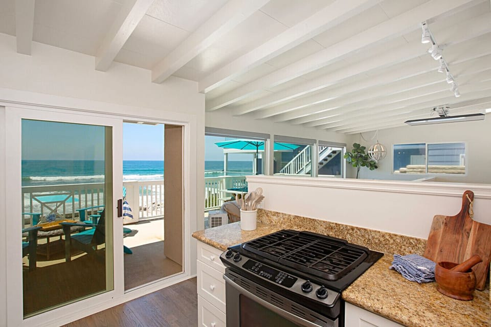 Oceanfront beach house in Oceanside, California with no street or sidewalk between the home and the sand. Wake up directly on the beach and enjoy one of the most desirable beachfront vacation rentals in Southern California.
