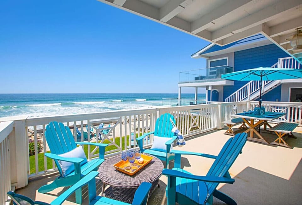 Oceanfront beach house in Oceanside, California with no street or sidewalk between the home and the sand. Wake up directly on the beach and enjoy one of the most desirable beachfront vacation rentals in Southern California.