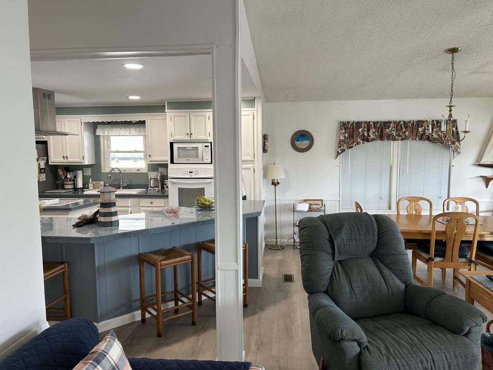 Cozy living and dining area with open kitchen access
