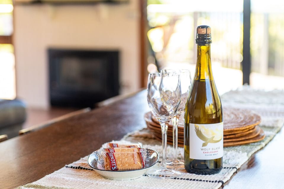Enjoy a complimentary bottle of wine and some sweet snacks