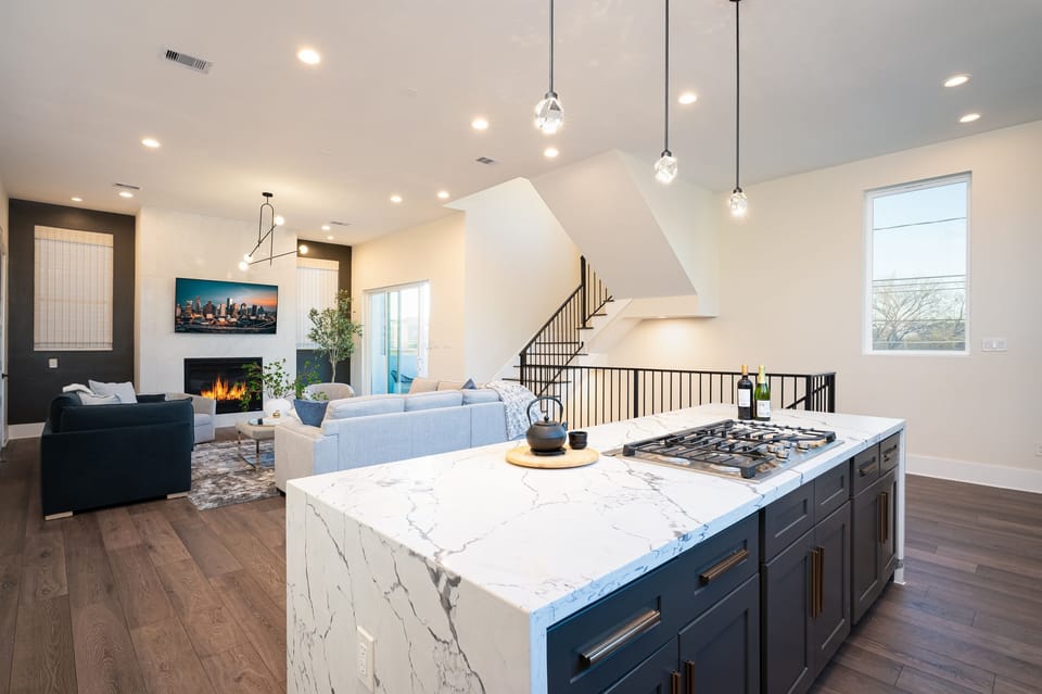 A dream kitchen, complete with sleek cabinets and a stunning countertop.