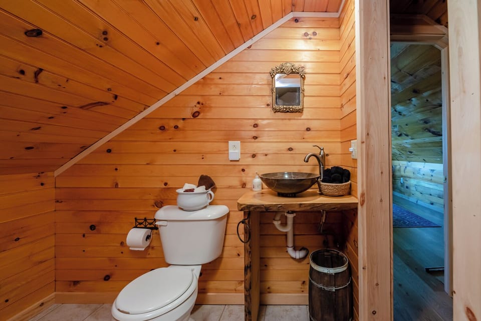 Semi-attached half bathroom to master suite