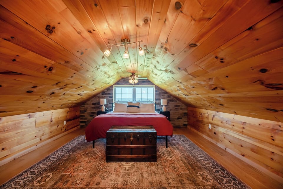 Magical all-wood king bedroom & semi-attached 1/2 bath w/view of horizon