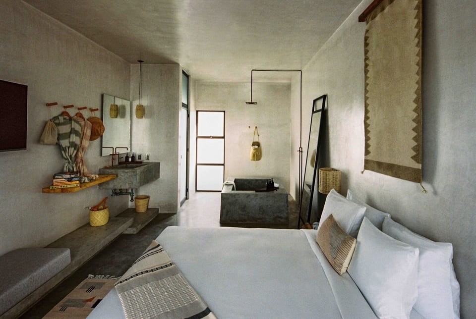 Unwind in minimalist calm with spa tub steps away.