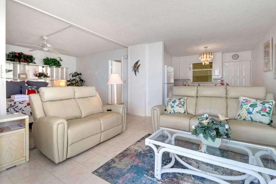 The studio combines living, dining, kitchen and a bedroom area in one open concept space.
