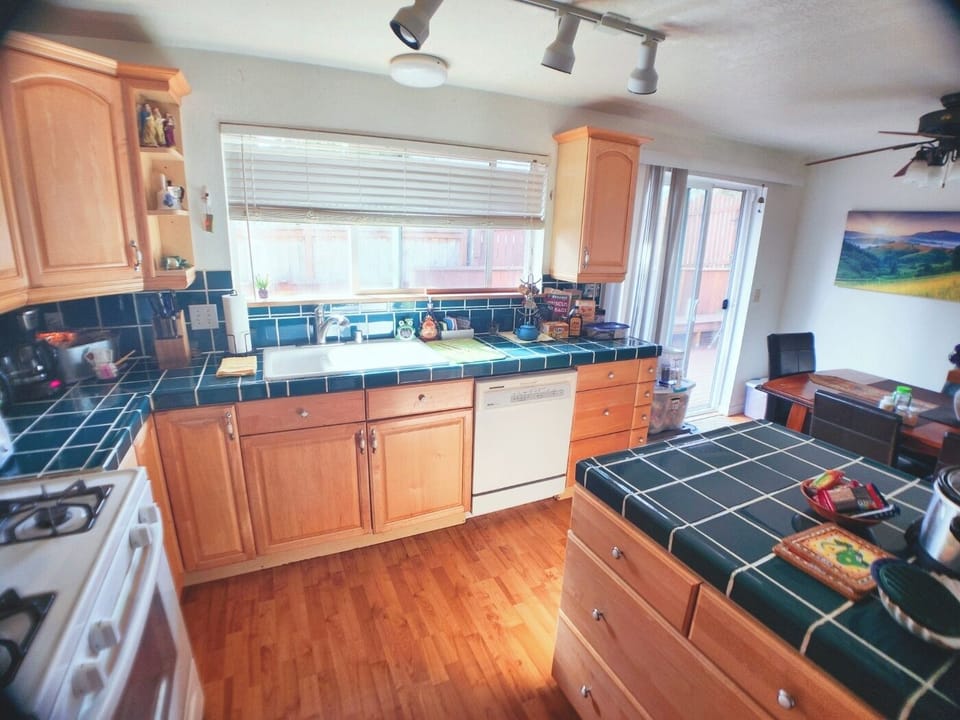 Large kitchen and oven/microwave stocked with all amenities. 