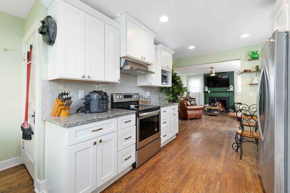 Modern Convenience Meets Classic Charm – This fully equipped kitchen features everything you need, from a Keurig and drip coffee maker to a five-burner stove and air fryer, making it perfect for cooking at home or just enjoying your morning coffee.
