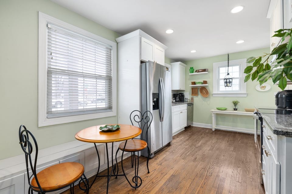 Cook Like a Local – Whether you’re making a home-cooked meal or enjoying takeout, this kitchen has all the essentials, including a microwave, spice rack, and large fridge.