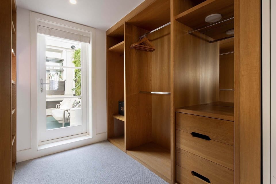 Walk in closet in bedroom 1 also leads to the indoor-outdoor patio.