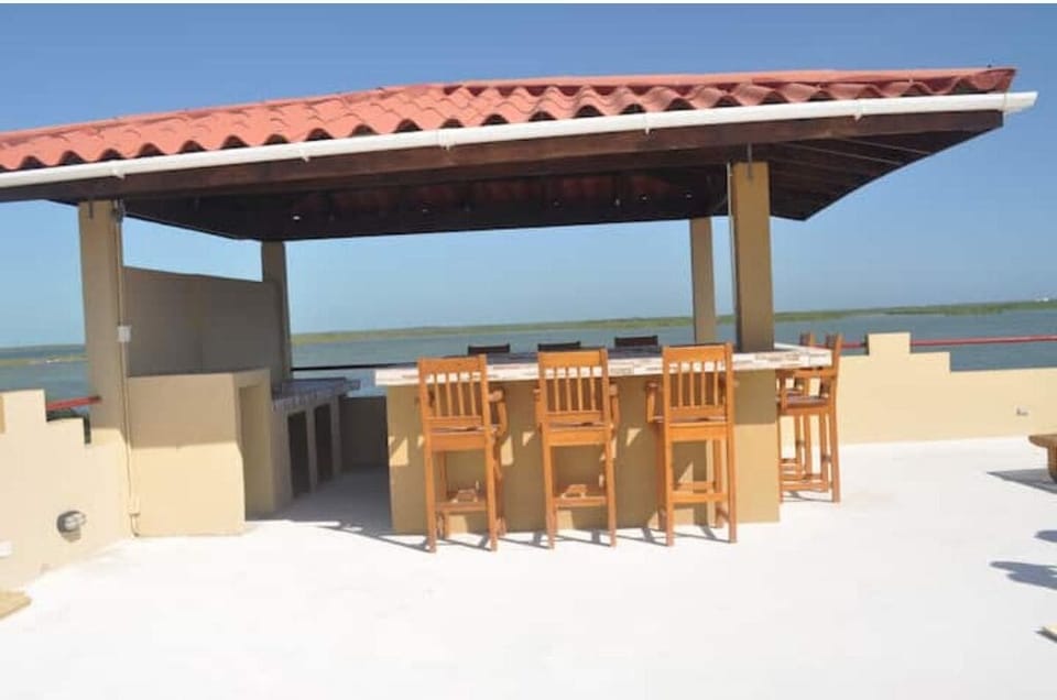 Palapa bar seating for 8, rexlax and enjoy