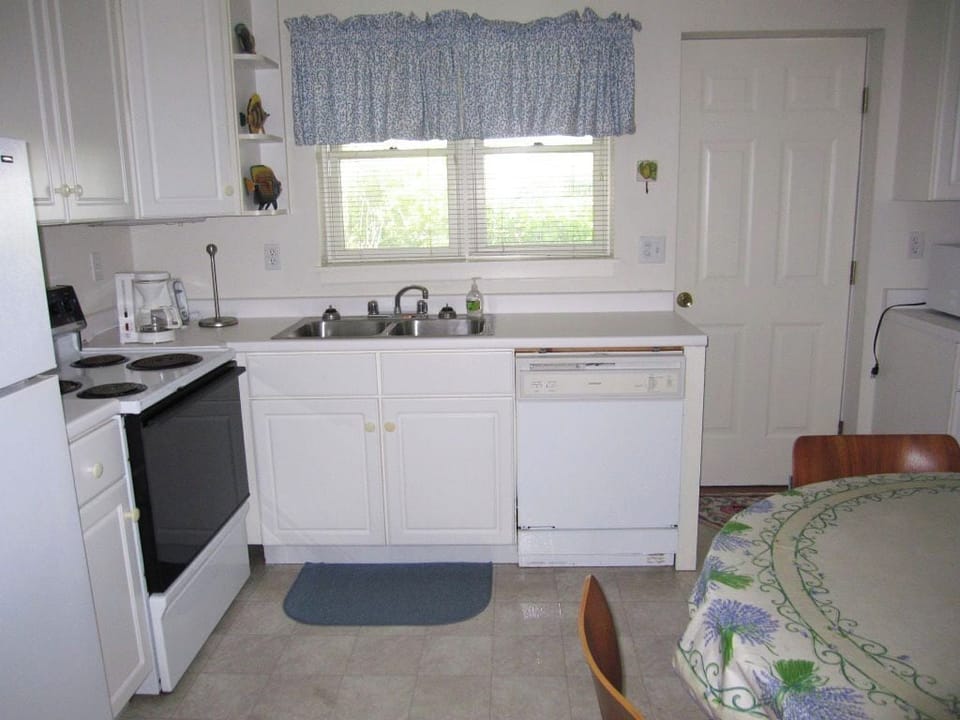  "Bright and functional downstairs kitchen—perfect for easy meals! 