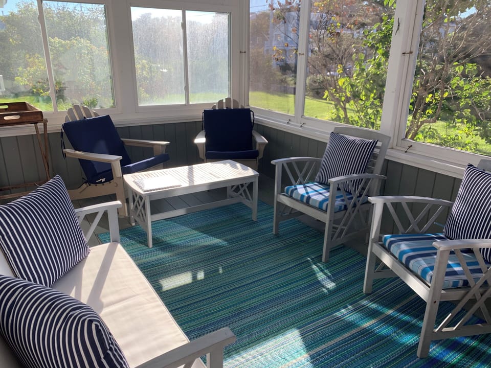 Streetside porch which is relaxing for a quiet lunch and watching the sun set.