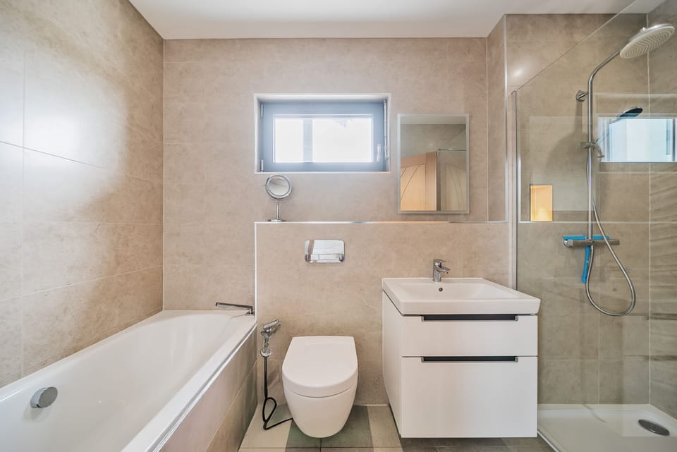 All Ways, Burton Bradstock: The ground floor bathroom with separate shower