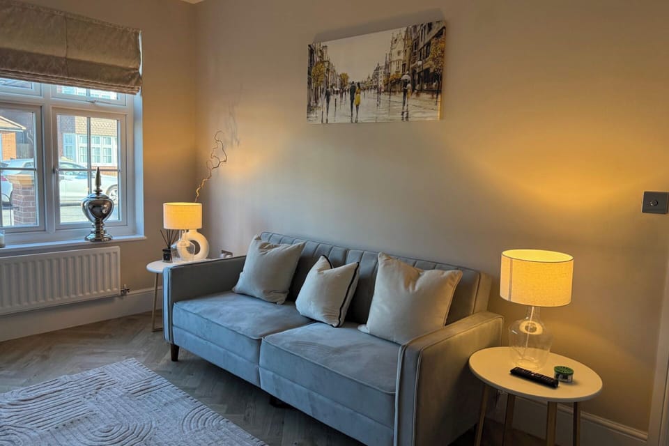 Living area plenty of space with 50inch TV privacy window tinted so no one can see in from outside along with electric Roman blinds 