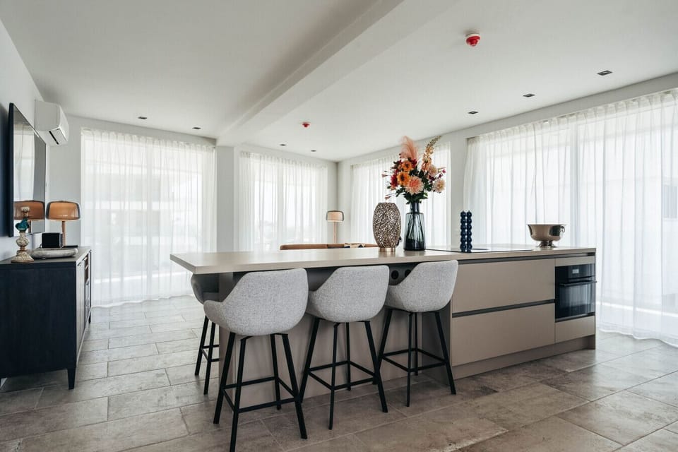Sunny days and good vibes! This inviting kitchen is the perfect spot for gathering and making memories.